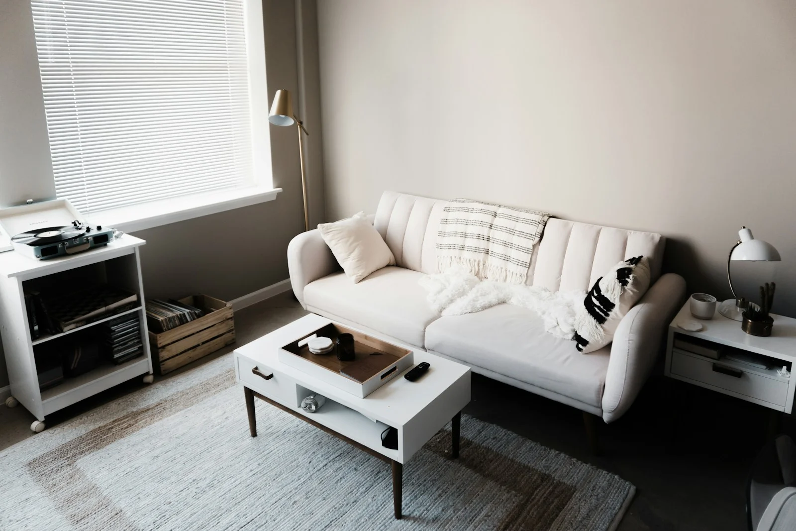 Minimalist Design Fact - white couch in front of white wooden table